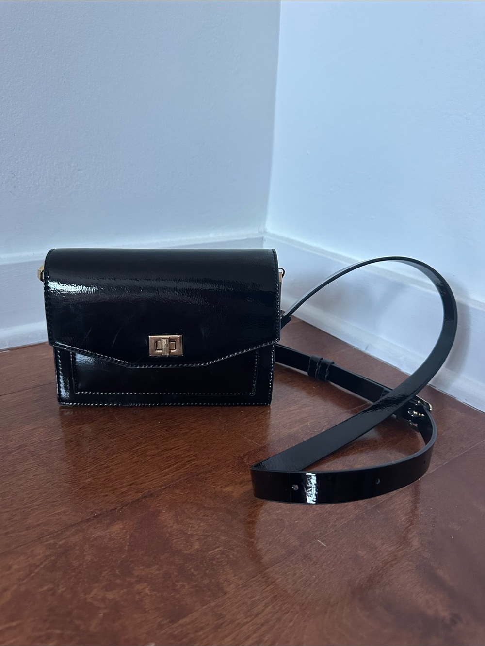 Glossy Black Patent Crossbody Bag with Gold Hardware